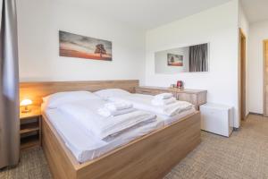 Posteľ alebo postele v izbe v ubytovaní Sport HOTEL Bečva