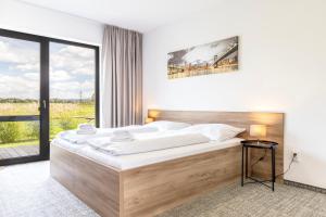 Posteľ alebo postele v izbe v ubytovaní Sport HOTEL Bečva