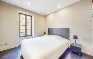 Ένα ή περισσότερα κρεβάτια σε δωμάτιο στο Cozy Home In La Cotiniere