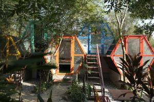 a set of two play structures in a garden at mehome Hidden Garden Homestay in Cư Chinh