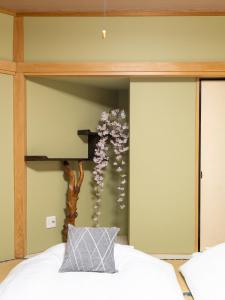 Postel nebo postele na pokoji v ubytování 浅草複式公寓 民宿 最大10人 浅草 浅草寺