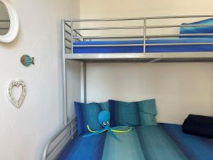 Postel nebo postele na pokoji v ubytování Casa Asmara Castiglioncello