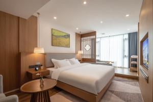 TV a/nebo společenská místnost v ubytování Z HOTEL- Qingchengshan