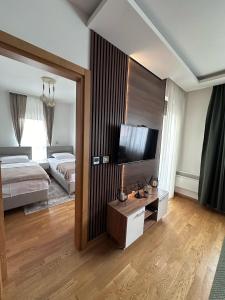 Una cama o camas en una habitación de Green West Zlatibor