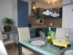 Kuchyň nebo kuchyňský kout v ubytování Appartement In Witzelroda Mit Grill Und Garten