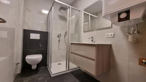 Kúpeľňa v ubytovaní Apartments Mikulan Nara