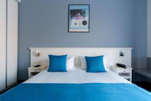 Postel nebo postele na pokoji v ubytování Hôtel Marso + 57 fotografií