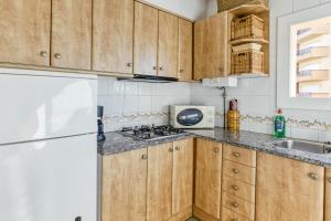 A kitchen or kitchenette at Apt Sol y Mar 2 dorm Playa Riells
