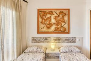 A bed or beds in a room at Apt Sol y Mar 2 dorm Playa Riells