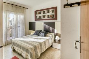 A bed or beds in a room at Apt Sol y Mar 2 dorm Playa Riells