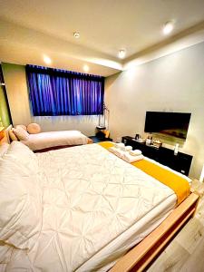 Voodi või voodid majutusasutuse Yi Piao B&B toas