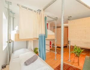 Posteľ alebo postele v izbe v ubytovaní Montagu Hostel