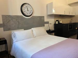 Posteľ alebo postele v izbe v ubytovaní Residenza Pedrotti