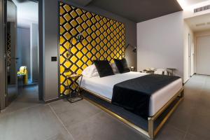 Postel nebo postele na pokoji v ubytování Catania Smart Hotel