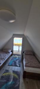 Letto o letti in una camera di Chata Domaša David
