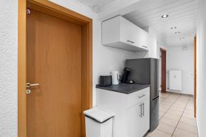 Η κουζίνα ή μικρή κουζίνα στο SE01 Work & Stay in Pfungstadt