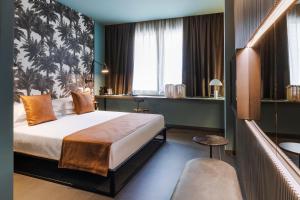 Postel nebo postele na pokoji v ubytování Catania Smart Hotel