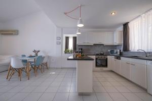 Η κουζίνα ή μικρή κουζίνα στο Ferienapartment Für Bis Zu Fünf Personen