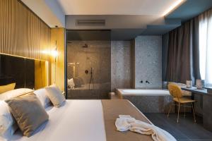Postel nebo postele na pokoji v ubytování Catania Smart Hotel