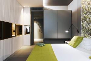 Postel nebo postele na pokoji v ubytování Catania Smart Hotel