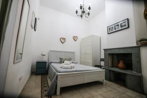 Postel nebo postele na pokoji v ubytování Ai Tintori