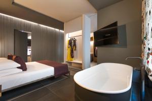 Postel nebo postele na pokoji v ubytování Catania Smart Hotel