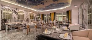 Ein Sitzbereich in der Unterkunft Botanik Hotel