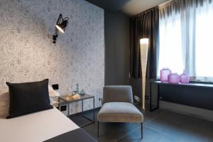 Postel nebo postele na pokoji v ubytování Catania Smart Hotel
