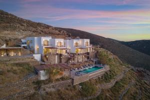 an aerial view of a house on a hill at Kastellas' Dream in Kithnos