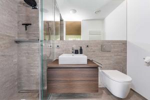 Koupelna v ubytování Luxus Chalet Skilift fußläufig Bergblick & Wellness