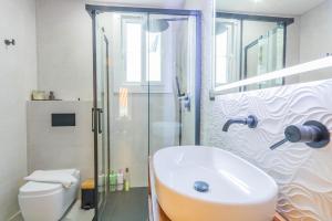 Koupelna v ubytování Luxury Downtown Station Córdoba + 12 fotografií