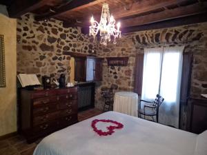 Posteľ alebo postele v izbe v ubytovaní La Casa dels Poetes