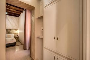 Colosseo Accomodation Room Guest House客房内的一张或多张床位