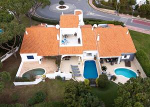 an overhead view of a house with an orange roof at Villa Florida in Almancil