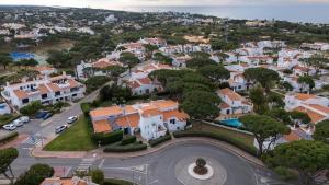an aerial view of a residential neighborhood with houses at Villa Florida in Almancil