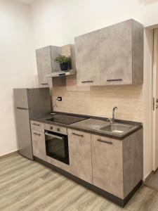 Nhà bếp/bếp nhỏ tại Appartamento nuovo a 1 minuto dal porto