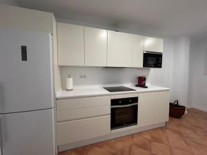 Cuina o zona de cuina de PLAYA ROCIO 62 2 PUERTO BANÚs