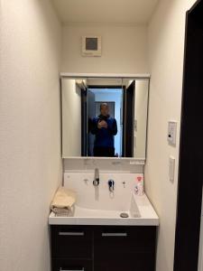 Salle de bains dans l'établissement Mark的足立江北站民宿