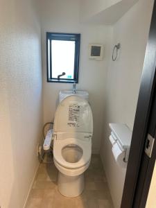 Salle de bains dans l'établissement Mark的足立江北站民宿