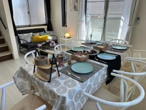Coin salon dans l'établissement Mark的足立江北站民宿