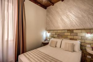 Colosseo Accomodation Room Guest House客房内的一张或多张床位
