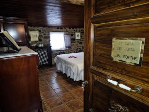 Posteľ alebo postele v izbe v ubytovaní La Casa dels Poetes