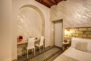 Colosseo Accomodation Room Guest House客房内的一张或多张床位