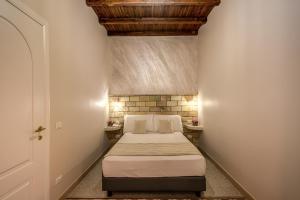 Colosseo Accomodation Room Guest House客房内的一张或多张床位