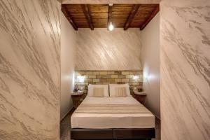 Colosseo Accomodation Room Guest House客房内的一张或多张床位