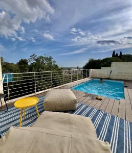 a balcony with a pool on top of a building at Villetta Panorama - Private Pool in Parabita