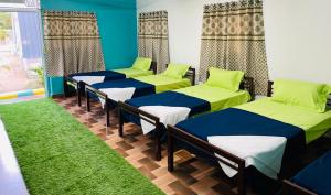 Posezení v ubytování GreenLeaf Resorts and Restaurant
