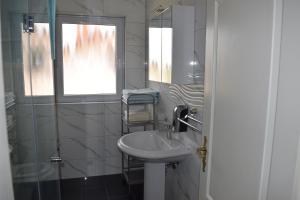 O baie la Apartments Grgic