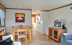 Kuchyň nebo kuchyňský kout v ubytování Strandnahes Chalet Mit Überdachter Veranda
