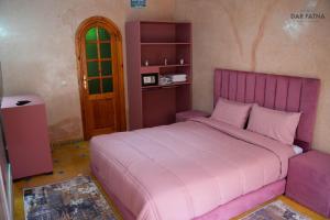 Ένα ή περισσότερα κρεβάτια σε δωμάτιο στο Dar Fatna Marrakech